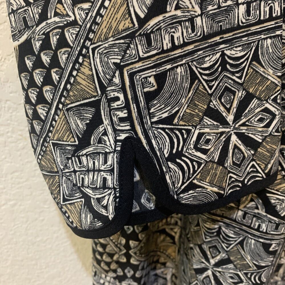 Catherines Tunic Blouse with Geometric Print & Cut Out Accent Around Neck 14/16W